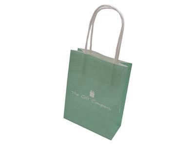 Sac cadeau en papier avec poignée torsadée