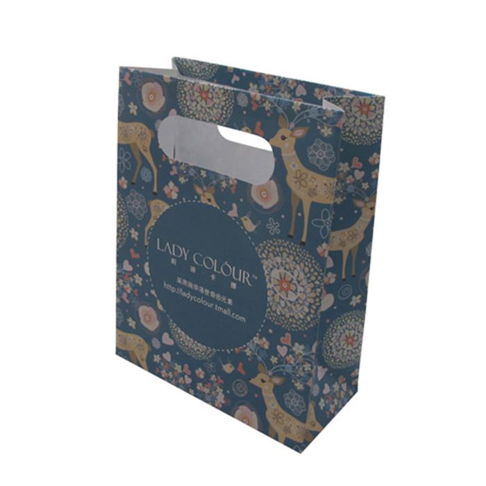 Sac en papier laminé, avec poignée découpée